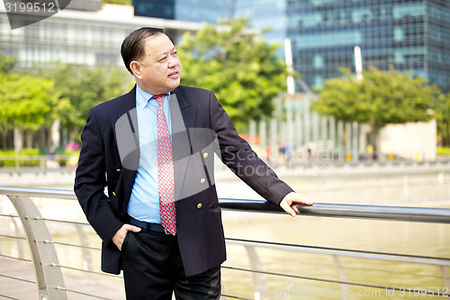 Image of Asian businessman smiling portrait