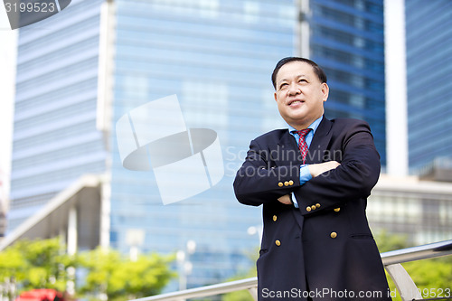 Image of Asian businessman smiling portrait