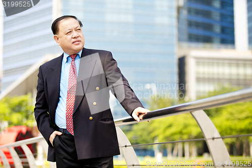 Image of Asian businessman smiling portrait