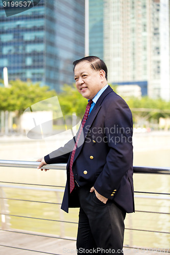 Image of Asian businessman smiling portrait