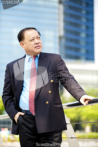 Image of Asian businessman smiling portrait