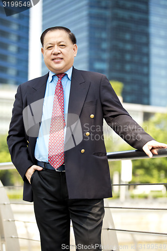 Image of Asian businessman smiling portrait