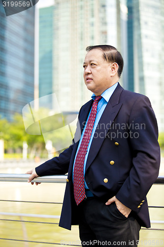 Image of Asian businessman smiling portrait