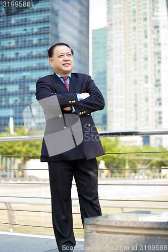 Image of Asian businessman smiling portrait