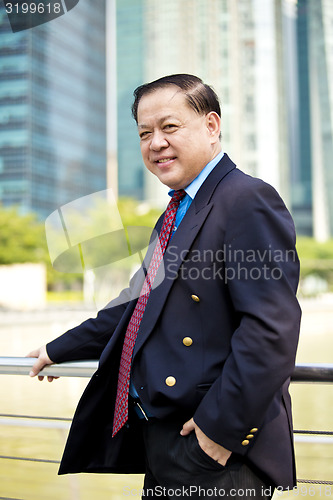 Image of Asian businessman smiling portrait