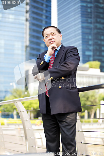 Image of Asian businessman smiling portrait