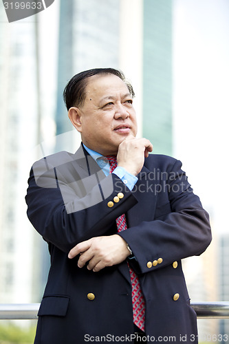 Image of Asian businessman smiling portrait
