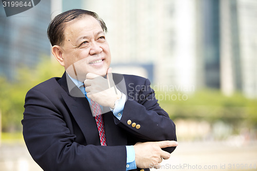 Image of Asian businessman smiling portrait