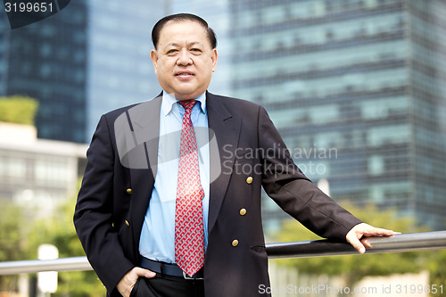 Image of Asian businessman smiling portrait