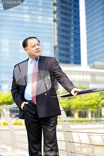 Image of Asian businessman smiling portrait