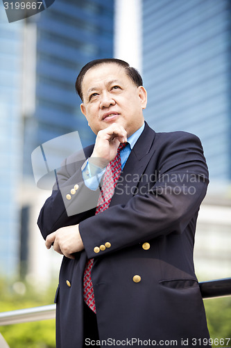 Image of Asian businessman smiling portrait