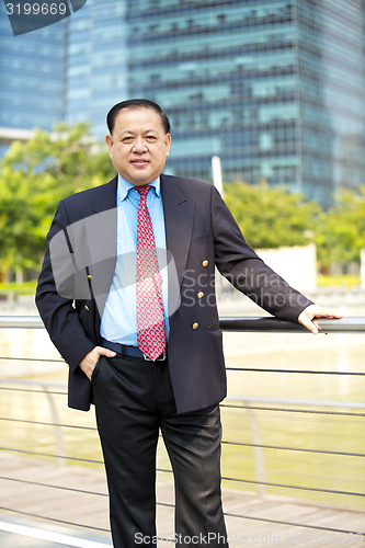 Image of Asian businessman smiling portrait