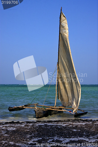 Image of beach and boat in tanzania zanzibar