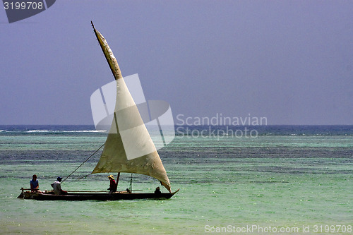 Image of beach and boat in  zanzibar