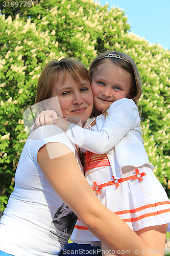 Image of mother and daughter embrace