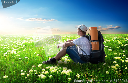 Image of Tourist on flower field