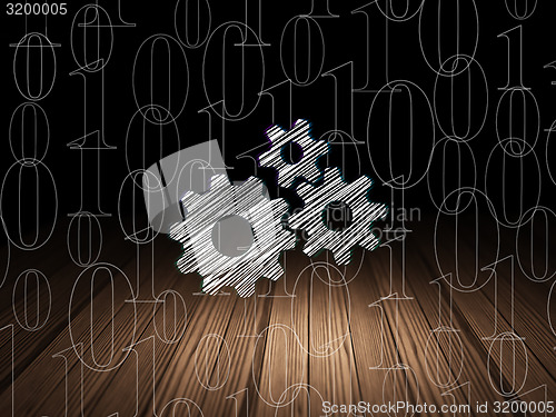 Image of Information concept: Gears in grunge dark room