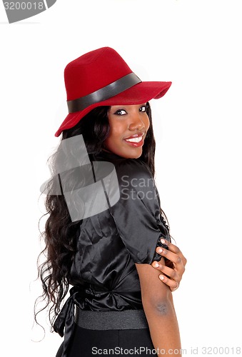 Image of Black woman looking over shoulder.
