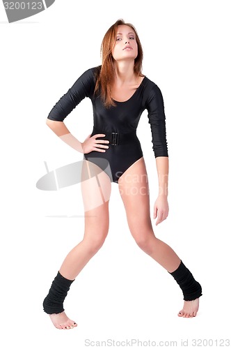 Image of Beautiful girl in black gymnastic suit