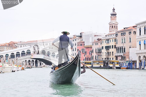 Image of venice italy, gondola driver in grand channel