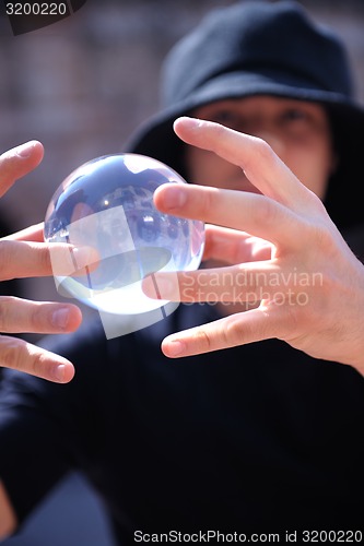 Image of balancing glass ball