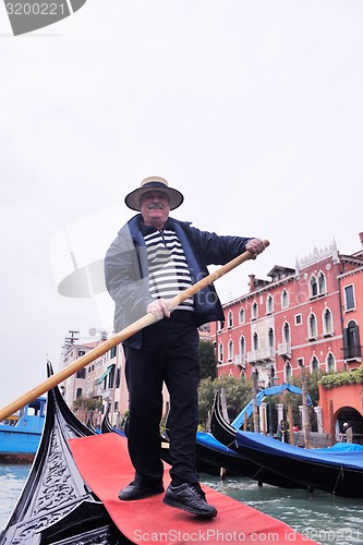 Image of venice italy, gondola driver in grand channel