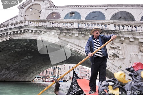 Image of venice italy, gondola driver in grand channel