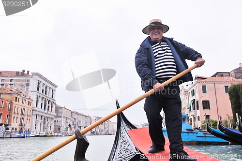 Image of venice italy, gondola driver in grand channel