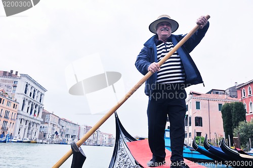 Image of venice italy, gondola driver in grand channel