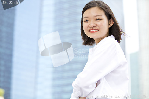 Image of Asian young female executive smiling portrait