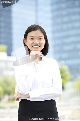 Image of Asian young female executive smiling portrait