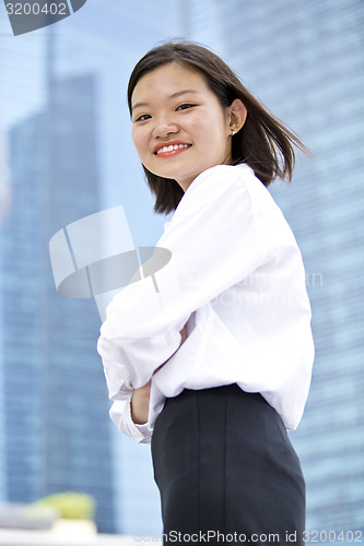 Image of Asian young female executive smiling portrait
