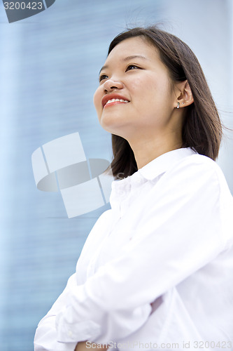 Image of Asian young female executive smiling portrait