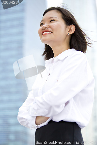 Image of Asian young female executive smiling portrait