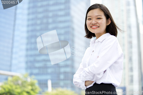 Image of Asian young female executive smiling portrait