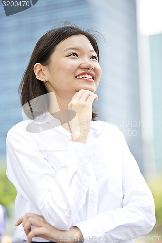 Image of Asian young female executive smiling portrait
