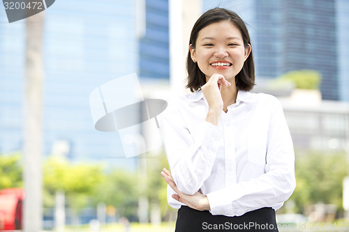 Image of Asian young female executive smiling portrait