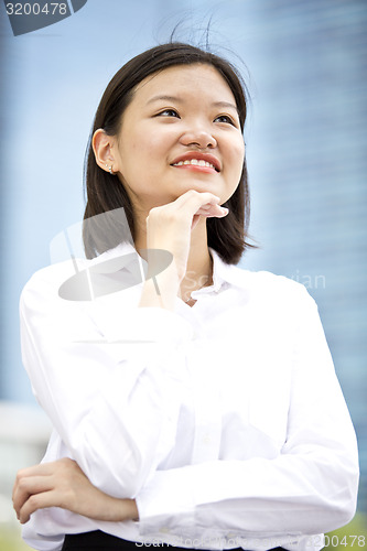 Image of Asian young female executive smiling portrait