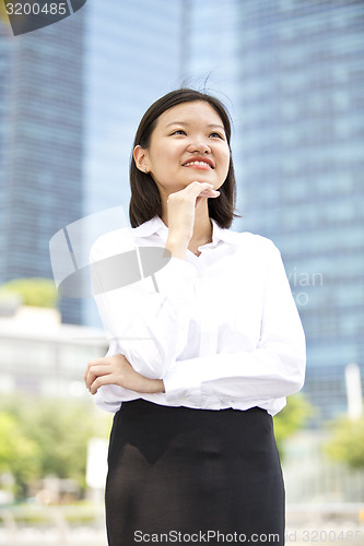 Image of Asian young female executive smiling portrait