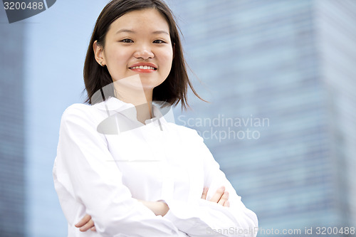 Image of Asian young female executive smiling portrait