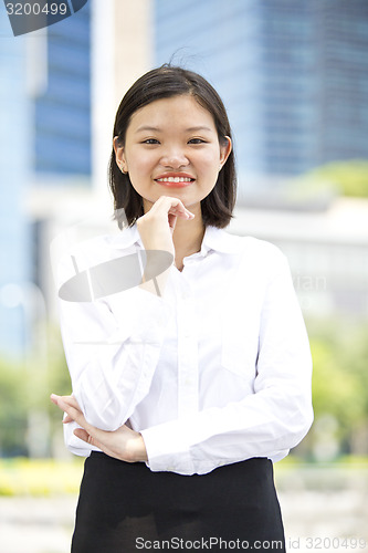 Image of Asian young female executive smiling portrait