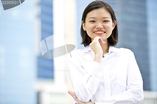 Image of Asian young female executive smiling portrait