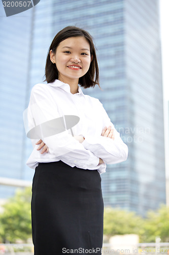 Image of Asian young female executive smiling portrait