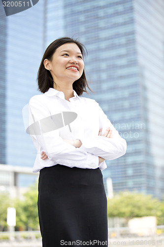 Image of Asian young female executive smiling portrait