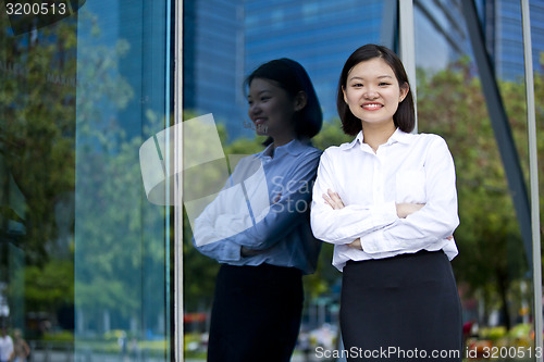 Image of Asian young female executive smiling portrait