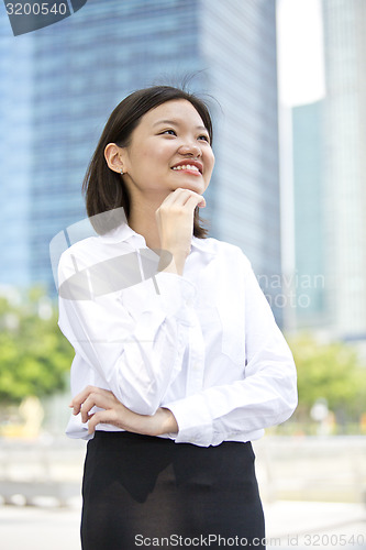 Image of Asian young female executive smiling portrait