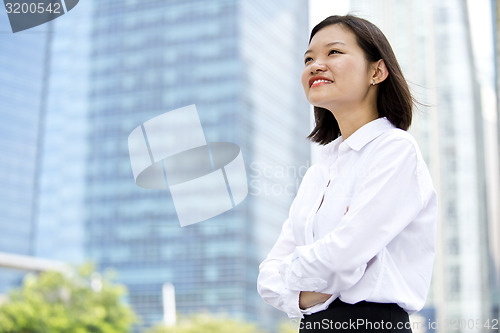 Image of Asian young female executive smiling portrait