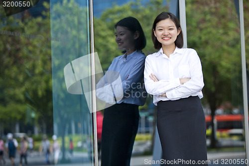 Image of Asian young female executive smiling portrait