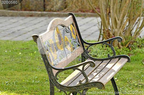 Image of park bench in a garden