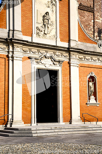 Image of  church  in  the mozzate  old   closed brick   sidewalk italy  l